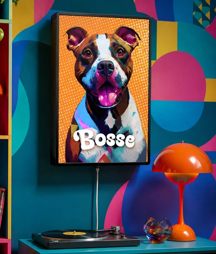 Bosse the dog in a pop art painting. The painting has been applied to a wall speaker that sits in a colorful, retro-style room.